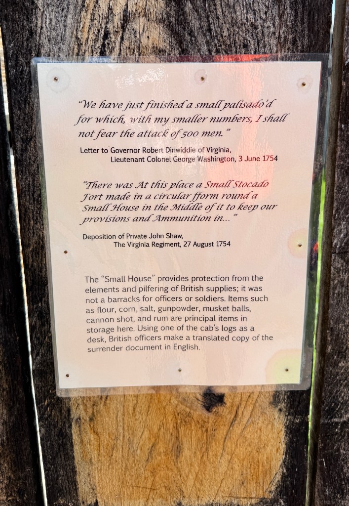 An informative plaque detailing historical quotes and the function of the 'Small House' as a protective structure during the 1750s in Virginia.